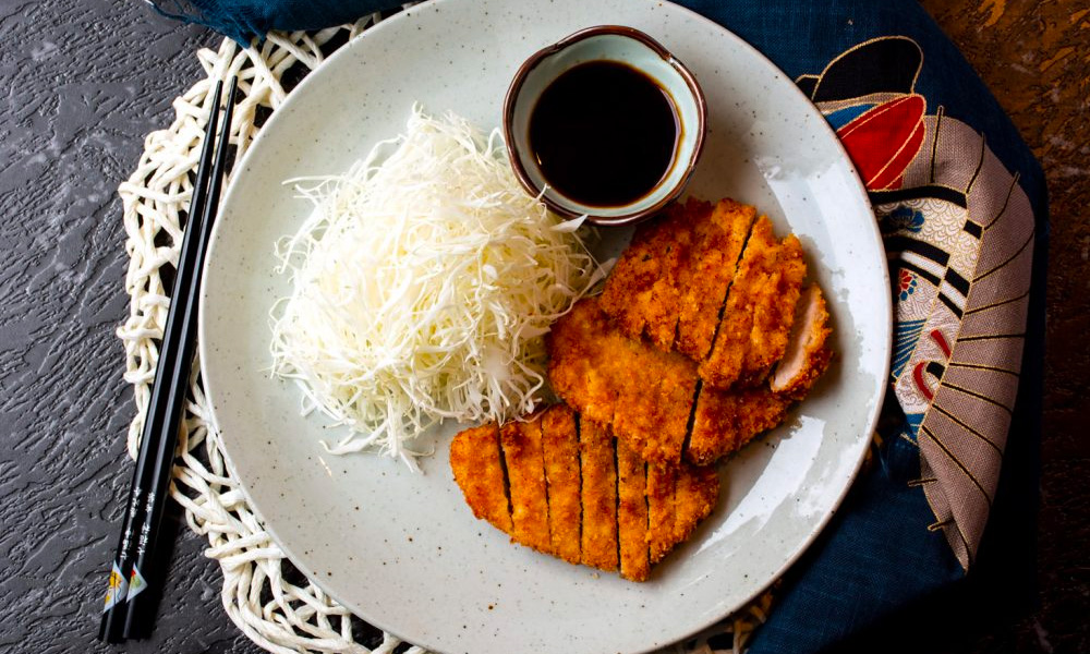 Japanese Tonkatsu Pork Cutlet Coated with Panko Bread Crumbs with Cabbage