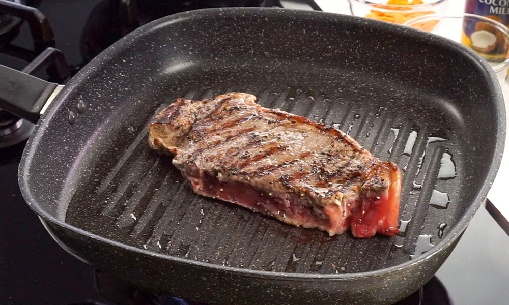 Grill steak in a pan