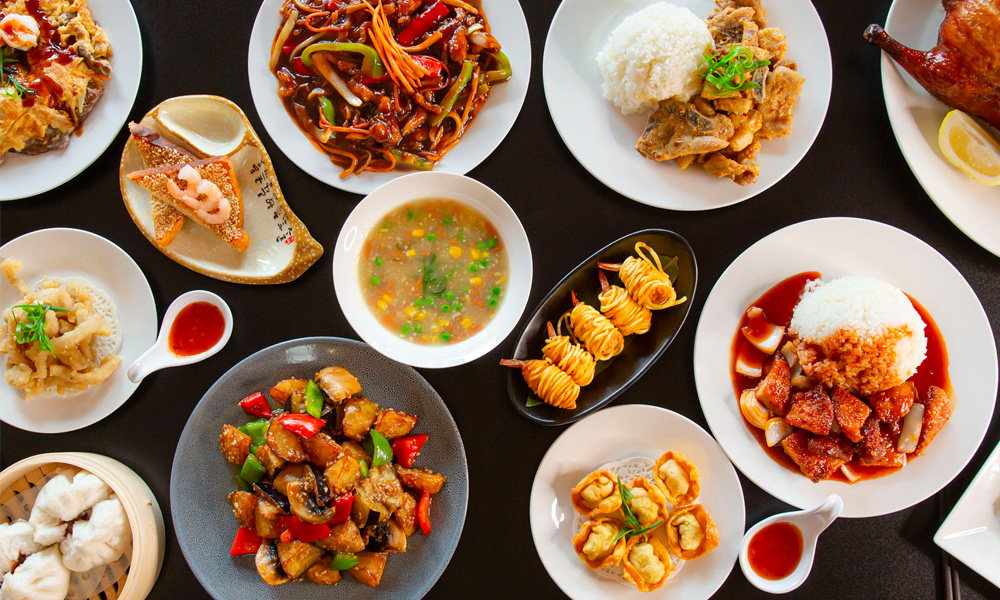 Table full of Chinese dishes