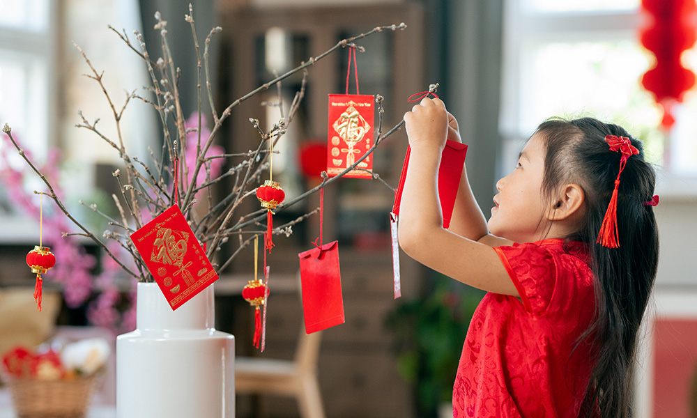 Hanging Red Envelopes on a Tree Lunar New Year's Eve