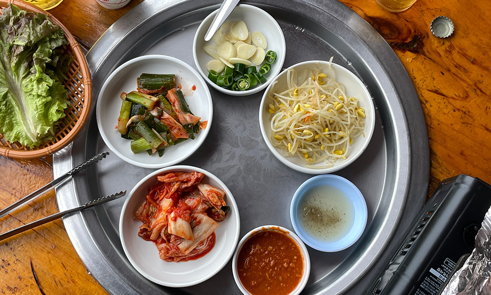 Korean BBQ wraps, side dishes and dipping sauces