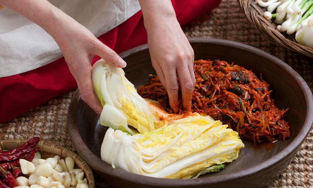 Making Kimchi in a large bowl