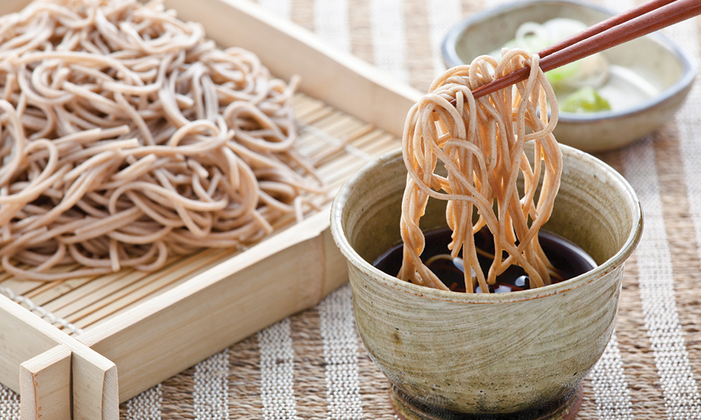 Soba noodles dipped in Mentsuyu sauce
