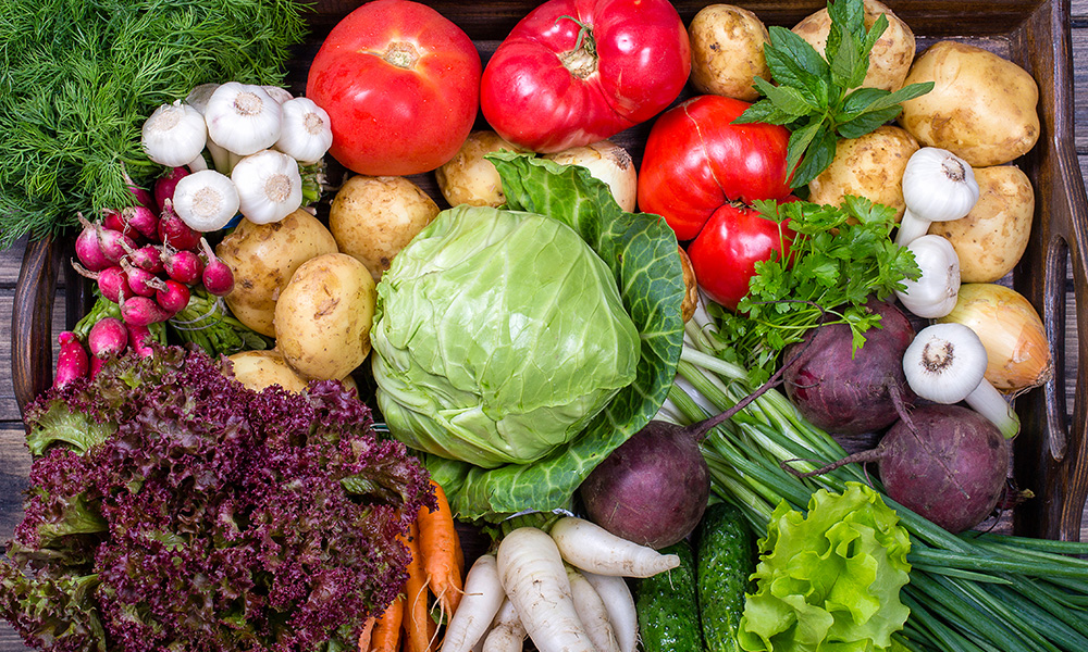 Big box filled with fresh vegetables