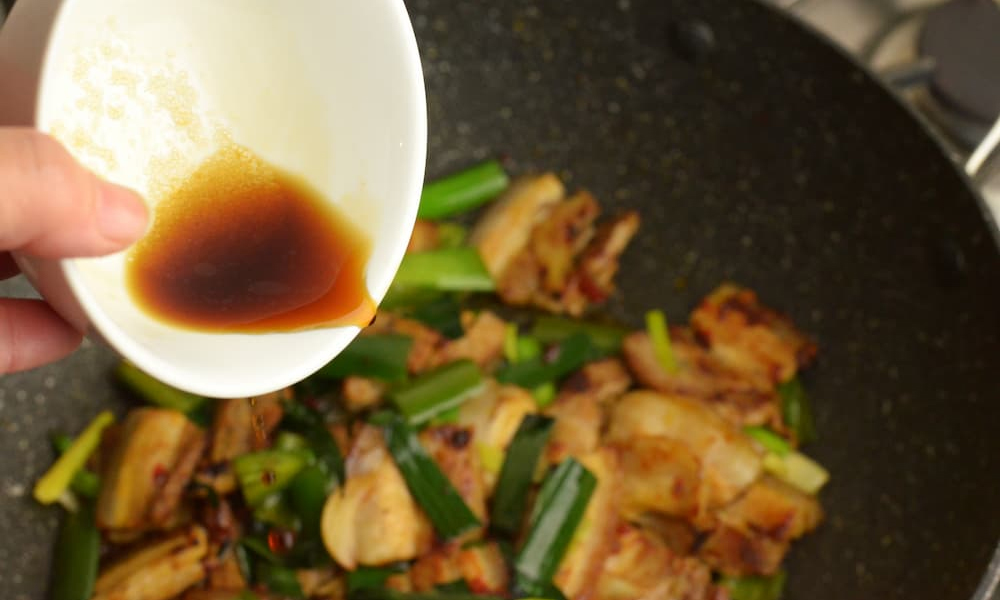 Adding in Shaoxing wine to pan