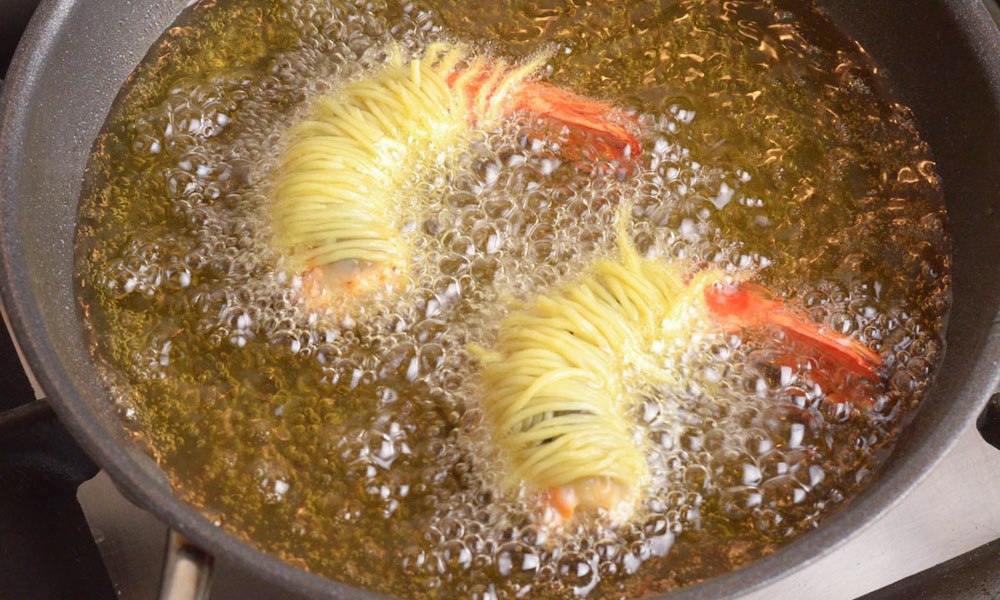 LNY Chinese noodle-wrapped prawns